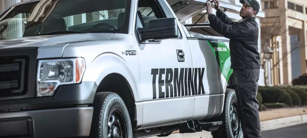 Terminix technician with service truck
